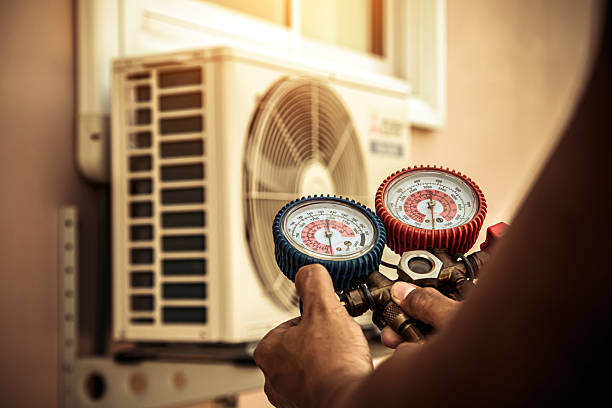 Professional Heat Pump Repair technician working in Clay City, KY